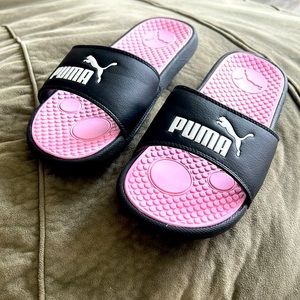 These slides are a soft pink, squishy material, and I have worn them twice!